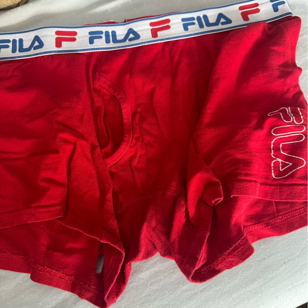 Used men’s red fila boxer trunks.